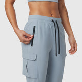Tetra-Lite Cargo High Rib Jogger in Light Sky, model wearing, side view