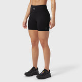 Black LYCRA® ADAPTIV biker shorts worn by model, front view