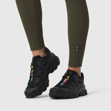 W071 Lycra Ribbed Legging in olive worn with black sneakers, legs visible