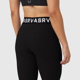 W071 Lycra Ribbed Legging in black, worn by model from waist down, back view
