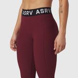 W071 LYCRA® Ribbed Legging in crimson, modeled from waist down showing fitted silhouette