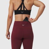 W072 LYCRA® ADAPTIV 4 Pocket Legging in Crimson, back view worn with sports bra