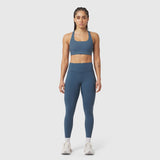 W072 LYCRA® ADAPTIV 4 Pocket Legging in storm blue, worn by model standing facing camera