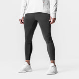 Thermal Hybrid Jogger in space grey worn by male model, back view