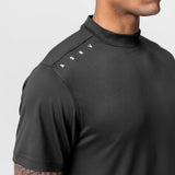 Core Mock Neck Tee in black worn by model, shoulder detail view
