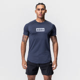 AeroSilver Established Tee in navy with box logo, worn by model