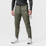 All Condition Moto Jogger in olive worn by model, front view