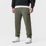 Tech-Terry Cinch Cargo Jogger in olive worn by model, back view