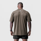 Core Mesh Oversized Tee in deep taupe, back view on model wearing black shorts