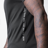 Core Mesh Established Tee in black worn by model, side view showing sleeve and graphic print