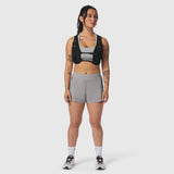 1080 Run Pack in black, front view on model