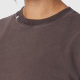 Distressed Relaxed Tee in Dark Earth worn by model, neckline detail view