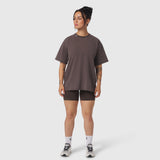 Distressed Relaxed Tee in dark earth worn with black shorts and white socks, front view on model