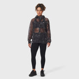 Weather-Ready Transparent Ripstop Shell Jacket in pixel camo, worn with black leggings