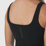 Black LYCRA® 2-in-1 tank top worn by model, back view showing snap closure detail
