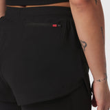 Tetra-Lite Liner Short in black worn by model, side detail view showing pocket