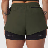 Tetra-Lite Liner Short in olive and black, back view on model