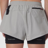Tetra-Lite Liner Short in Slate Grey worn by model, back view showing layered design