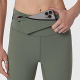 LYCRA® 3-in-1 Legging in sage, model wearing and displaying waistband pocket