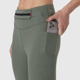 W030 LYCRA® 3-in-1 Legging in Sage, model holding phone in side pocket