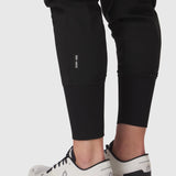 Tetra-Lite Cargo High Rib Jogger in black, worn with white sneakers, cropped view