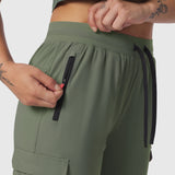 Tetra-Lite Cargo High Rib Jogger in sage, model detail shot of zipper pockets