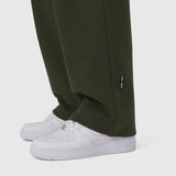 Olive Sorona® Terry straight leg sweats on model wearing white sneakers, cropped leg view