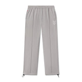 Flatlay of W036 Ripstop Relaxed Track Pant in slate grey, full length front view