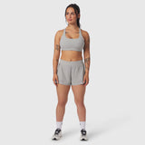 W039 Lycra Hybrid Sports Bra in slate grey, worn by model with matching shorts, front view