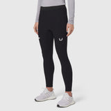 Black Lycra ribbed running tight on model, front view with white sneakers