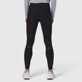 Black Lycra Ribbed Running Tight worn by model from behind, showing fitted silhouette and reflective details
