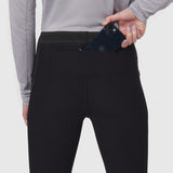 Black Lycra ribbed running tight worn by model, demonstrating phone pocket detail