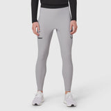 Lycra Ribbed Running Tight in slate grey worn by model with white sneakers, front view