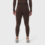 W059 Hybrid Belt-Pack Run Legging in dark earth, back view on model