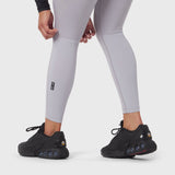 W059 Hybrid Belt-Pack Run Legging in slate grey worn with black sneakers, front view