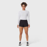Tetra-Lite Adventure Short in black, worn with white long-sleeve top, front view on model
