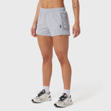 Tetra-Lite Adventure Short in slate grey, worn with white socks and running shoes