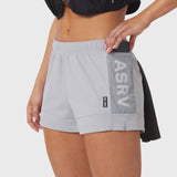 Tetra-Lite Adventure Short in slate grey worn by model, side view with hand in pocket