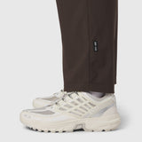 Tetra-Lite® Cargo City Pant in Dark Earth, worn with white sneakers, cropped view
