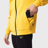 Dri-Core Sidelock Full Zip hoodie in amber yellow, worn by model holding phone in pocket