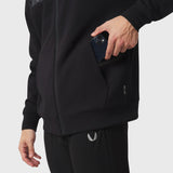 Dri-Core Sidelock Full Zip hoodie in black, worn by model holding phone in pocket