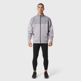 Dri-Core Sidelock Full Zip in slate grey, worn by model with black leggings, front view