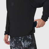 Tetra-Lite® Blade Collar Zip Jacket in black worn by model holding phone, white undershirt visible