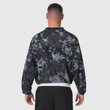 Tetra-Lite Blade Collar Zip Jacket in pixel camo, back view on model