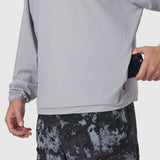 Tetra-Lite Blade Collar Zip Jacket in slate grey, worn by model holding phone