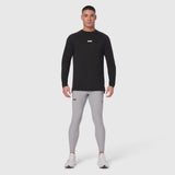 Polartec® Delta Longsleeve in black worn with grey leggings, front view