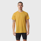 Polartec® Delta Training Tee in amber worn by model with black shorts, front view