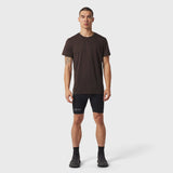 Polartec® Delta Training Tee in dark earth worn with black shorts, front view on model