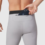 Lycra® Ribbed Running Tight in slate grey, model wearing tights with phone in waistband pocket