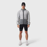 Weather-Ready Transparent Ripstop Shell Jacket in slate grey, worn by model with black shorts, front view